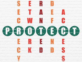 Image showing Protection concept: word Protect in solving Crossword Puzzle