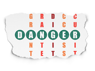 Image showing Safety concept: word Danger in solving Crossword Puzzle