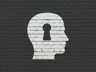 Image showing Business concept: Head With Keyhole on wall background