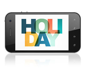 Image showing Tourism concept: Smartphone with Holiday on  display