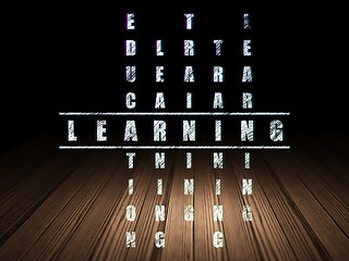 Image showing Learning concept: word Learning in solving Crossword Puzzle