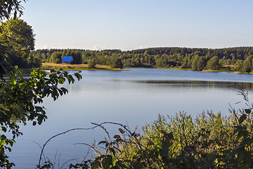 Image showing Rural house on riverside