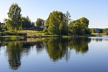 Image showing Village houses on riverside