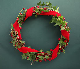 Image showing Christmas wreath with velvet ribbon