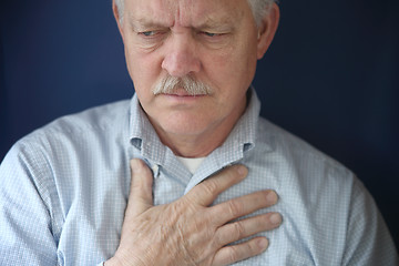 Image showing older man feeling pain in chest  