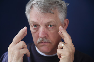 Image showing senior man crossing his fingers 