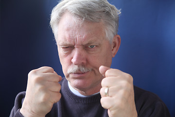 Image showing hostile and combative senior man