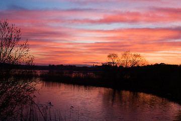 Image showing Sunset over  lake