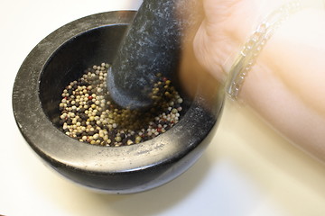 Image showing grinding peppercorns