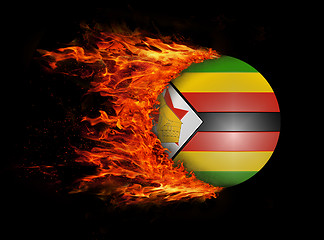 Image showing Flag with a trail of fire - Zimbabwe