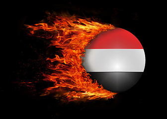 Image showing Flag with a trail of fire - Yemen