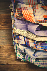 Image showing stack of bright colorful shirts