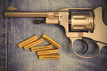 Image showing revolver with cartridges