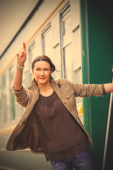 Image showing beautiful middle-aged woman depart on a trip