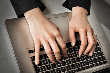 Image showing Typing on laptop