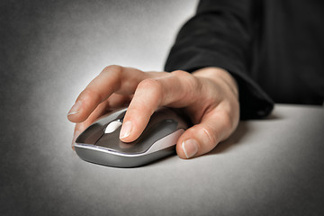 Image showing Female hand with computer mouse