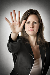Image showing Business woman hand stop