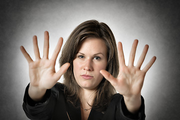 Image showing Business woman hand stop