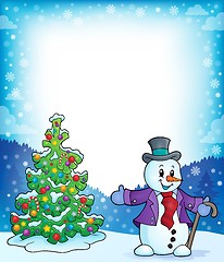 Image showing Frame with Christmas tree and snowman 1