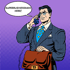 Image showing Super businessman hero talking phone success finance