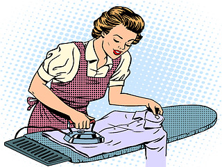Image showing Woman housewife wife stroking his shirt iron homework