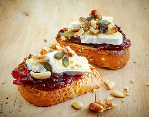 Image showing bread with jam and brie cheese