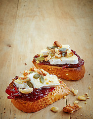 Image showing bread with jam and brie cheese