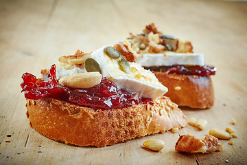 Image showing bread with jam and brie cheese