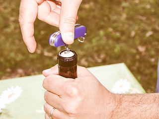 Image showing Retro looking Bottle opening