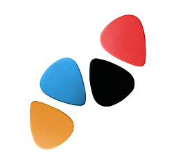 Image showing Closeup of 4 colourful plectrums