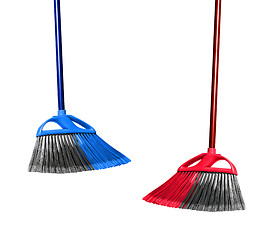 Image showing plastic blue and red brooms isolated