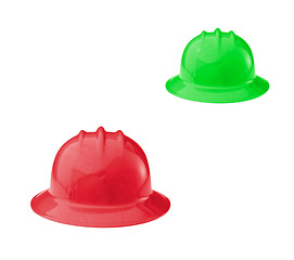 Image showing Red and green construction helmets shot