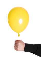 Image showing man holding yellow baloonn