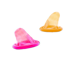 Image showing pink and yellow condoms