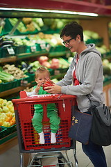 Image showing mother with baby in shopping