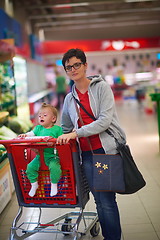 Image showing mother with baby in shopping