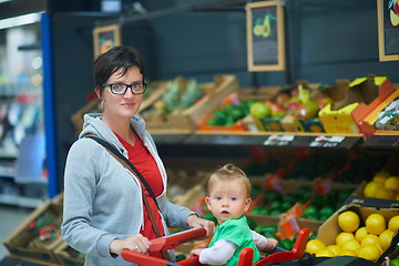 Image showing mother with baby in shopping