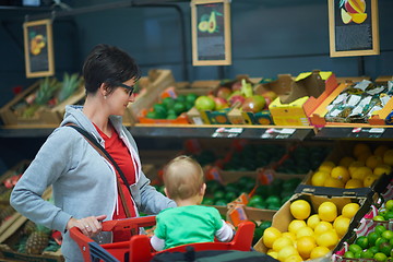 Image showing mother with baby in shopping