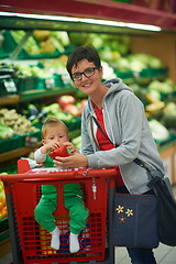 Image showing mother with baby in shopping