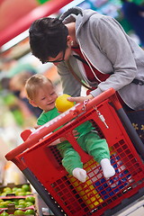 Image showing mother with baby in shopping