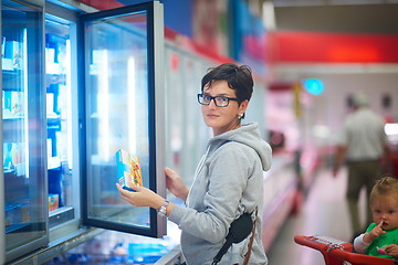 Image showing mother with baby in shopping