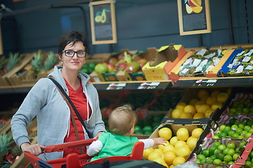 Image showing mother with baby in shopping