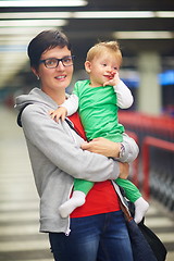 Image showing mother with baby in shopping