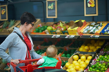 Image showing mother with baby in shopping