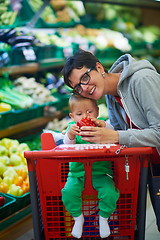 Image showing mother with baby in shopping