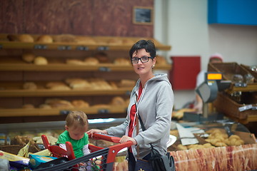 Image showing mother with baby in shopping