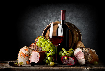 Image showing Wine and food on black