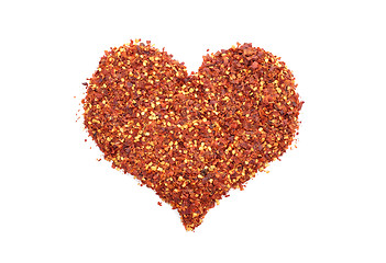 Image showing Hot and spicy crushed chillis in a heart shape