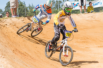 Image showing Leandro Lopes followed by Paulo Paiva