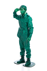 Image showing Man on a green toy soldier costume